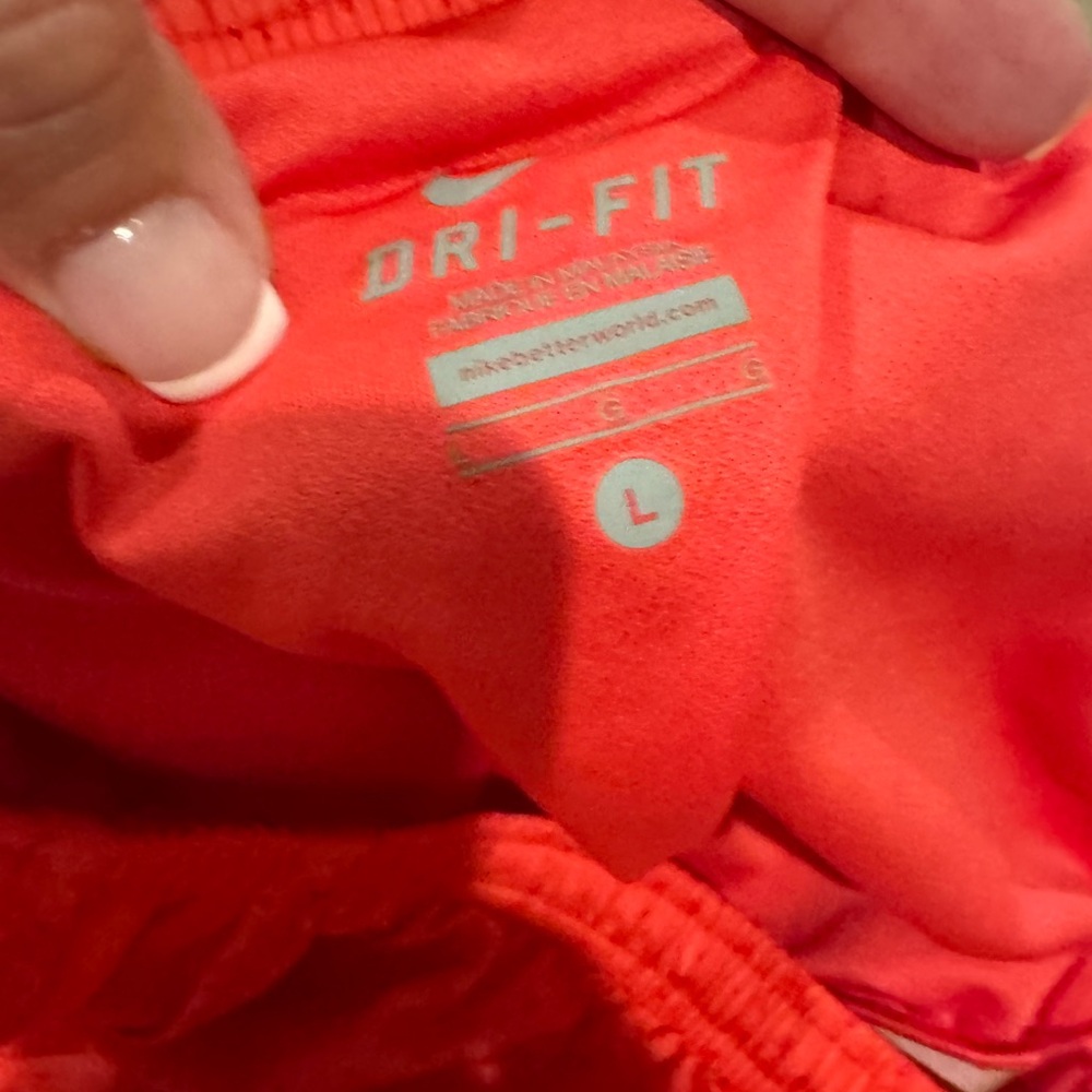 Nike Woman’s Dri-FI coral 
Shorts